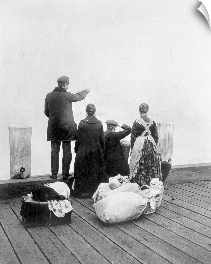 Immigrants on the dock at Ellis Island in New York Harbor, 1912.