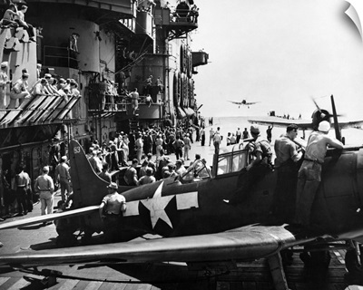 Inspection of returning planes on board the USS Saratoga
