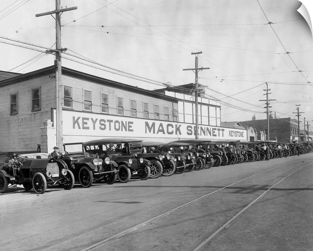 Mack Sennett's film studio in Los Angeles, Calif., with cars ready to depart to shoot a chase sequence.