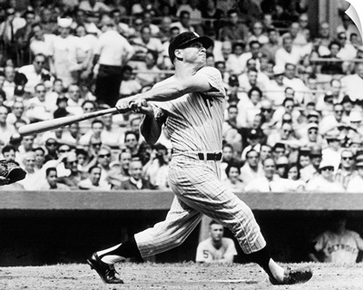 Mickey Mantle of the New York Yankees, hitting his 49th home run of the season