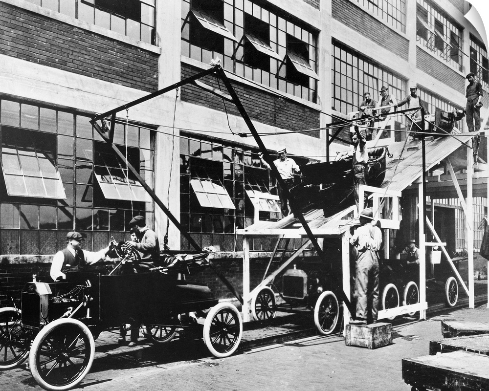 The last stage of the Model T assembly line at the Ford automobile plant in Highland Park, Michigan. Photograph, 1913.