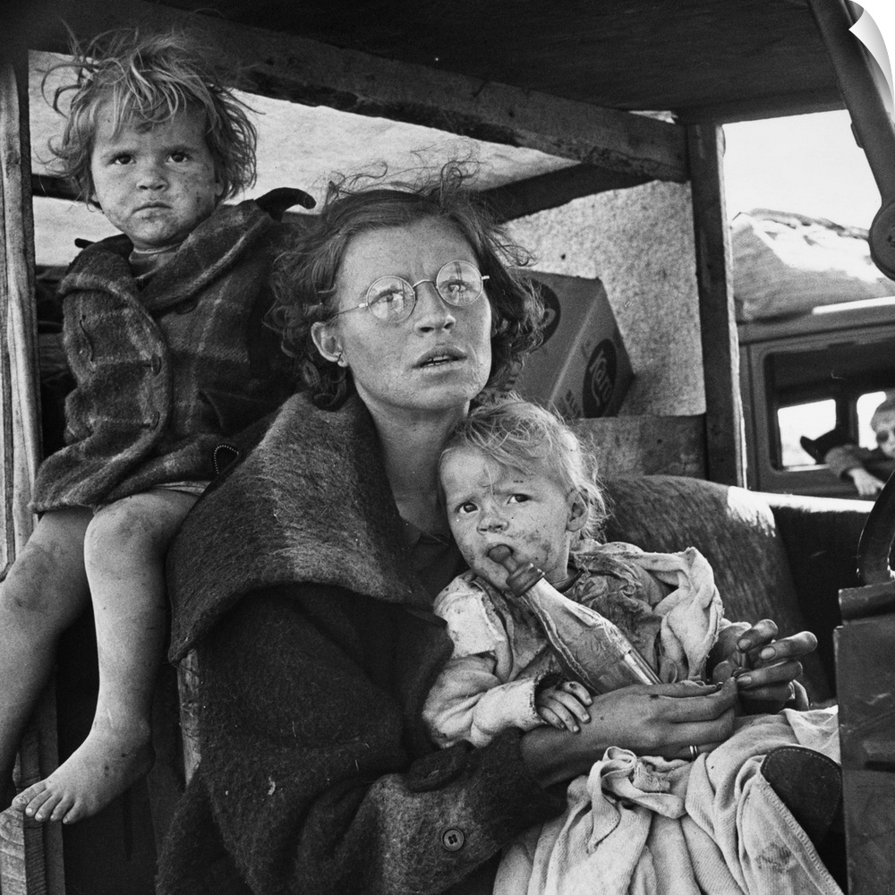 An impoverished family from Oklahoma arriving at a migrant workers' camp in Tulelake, Siskiyou County, California. Photogr...