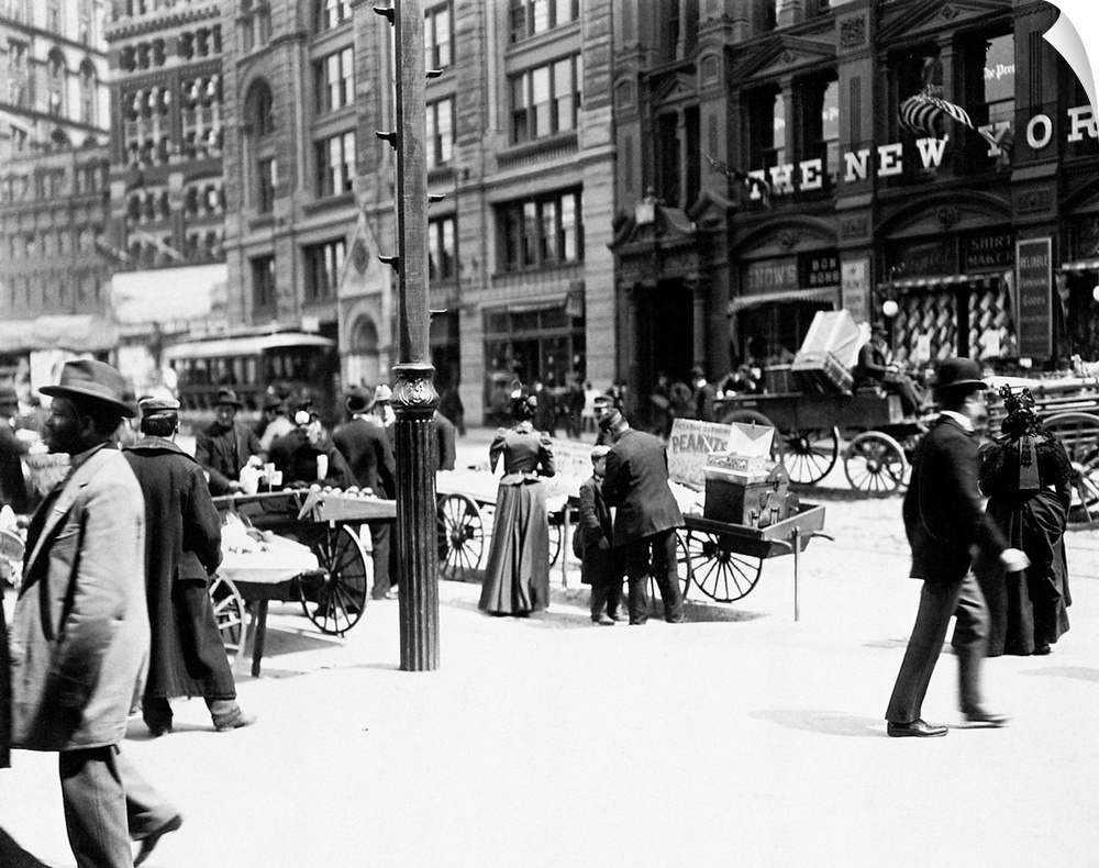 A scene on Park Row in Lower Manhattan, New York City. Photographed by Joseph Byron, 1895.