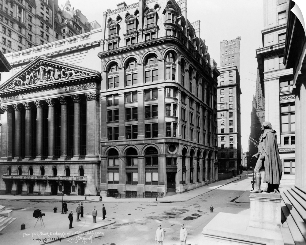 View of the New York Stock Exchange and Wilks Building on Wall Street in New York City. Photograph, c1920.