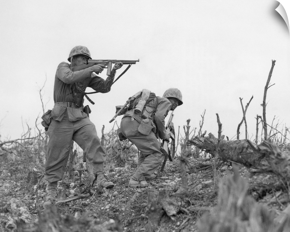 A U.S. Marine takes aim at a Japanese sniper near the town of Shuri, Okinawa, 1945.