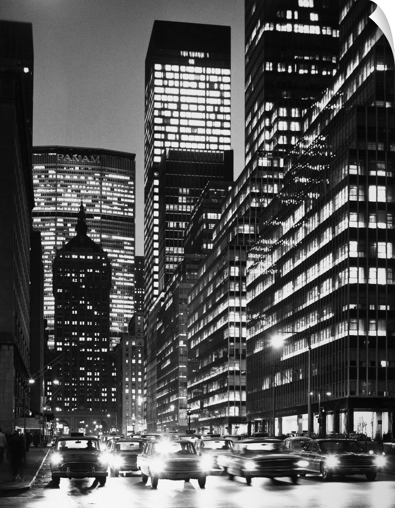 A view of Park Avenue in New York City at night, including Grand Central Station, the Pan Am Building (now the MetLife Bui...