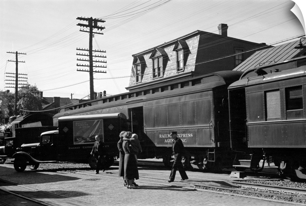 Passengers arriving at the railroad station in Hagerstown, Maryland. Photograph by Arthur Rothstein, 1937.