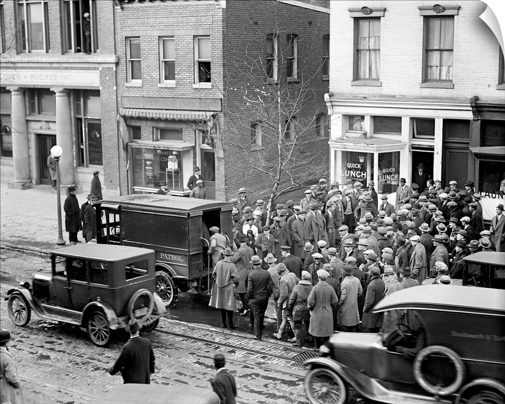 Police raid on a illegal gamblers' den on East 12th Street in New York City. Photographed on 31 January 1925.