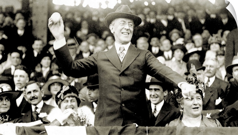 28th President of the United States. President Wilson throwing out the ceremonial first ball on opening day of the 1916 ma...