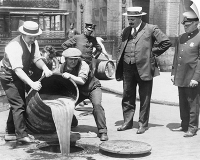 Prohibition, C.1921, agents pour liquor into a sewer