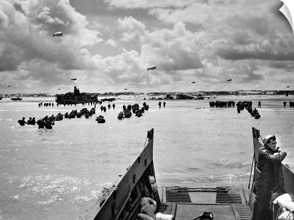 Reinforcements and supplies arrive at the beach of Normandy after the German army was driven back into the interior during...