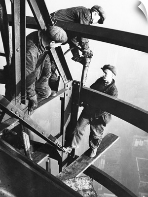 Steelworkers on girders of the Empire State Building, New York City, 1931