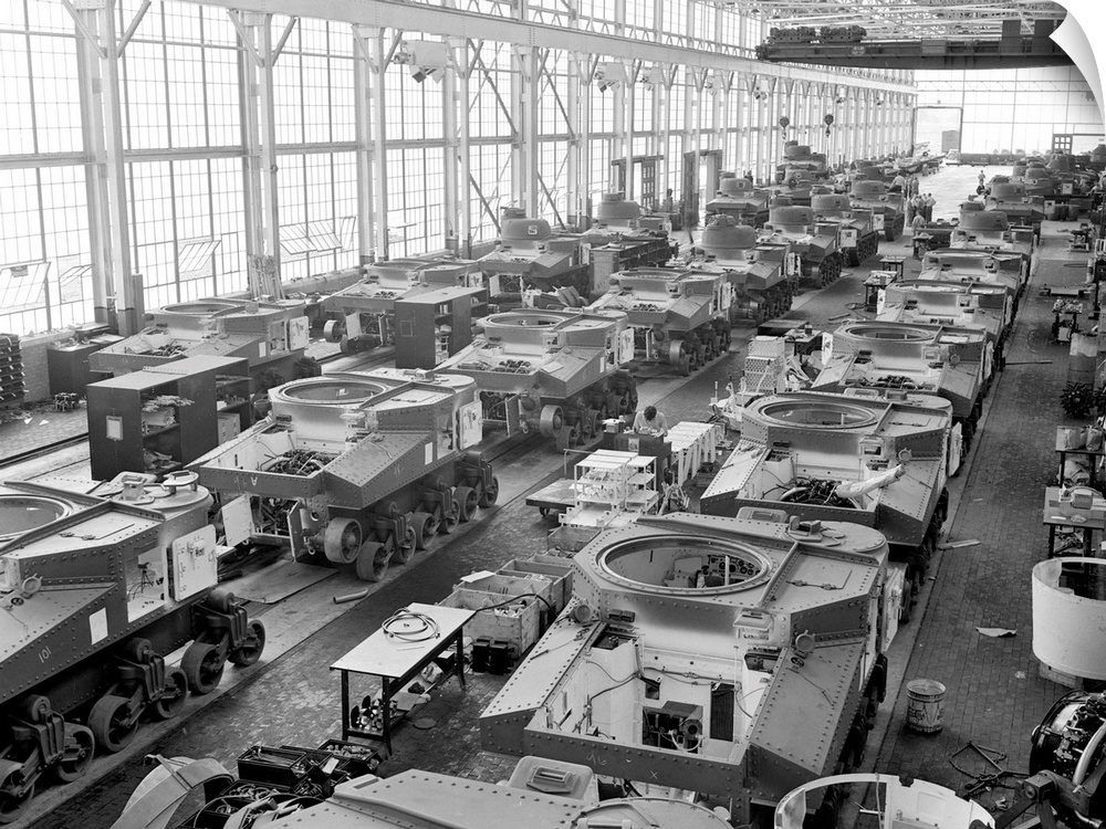 Assembly line production of M3 tanks at a Chrysler plant in Detroit, Michigan, during World War II. Photographed by Alfred...