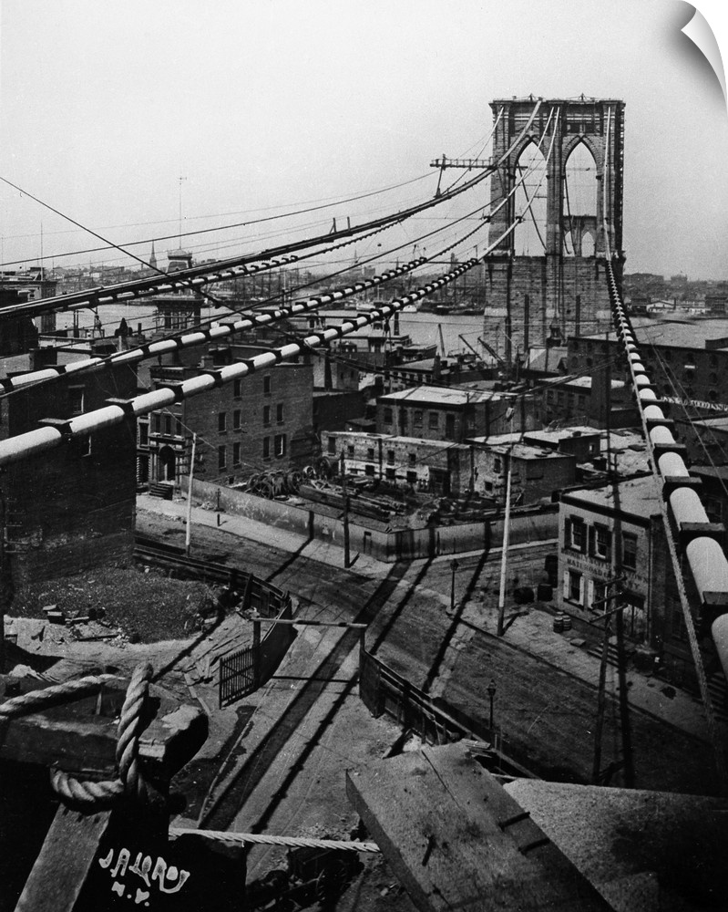 The Brooklyn Bridge under construction over the East River in New York City, c1880.