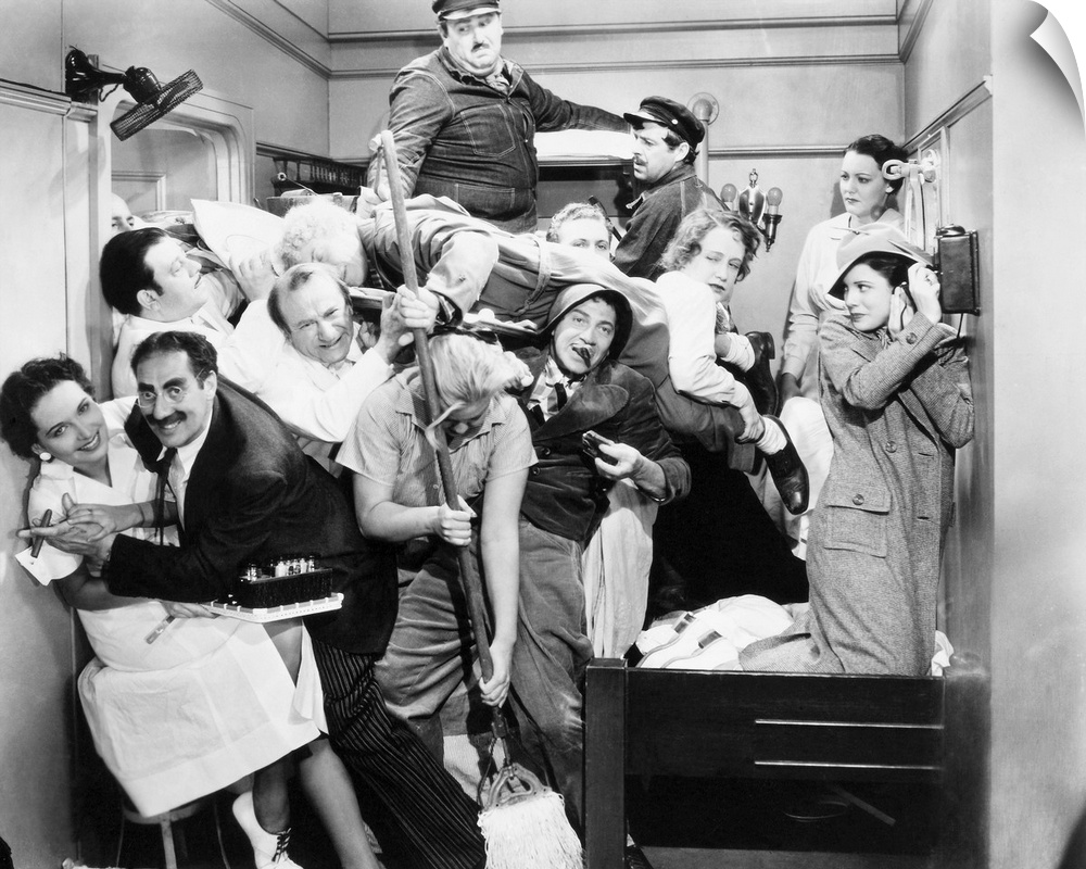 Some of the ship's crew join the Marx Brothers in their cabin in 'A Night at the Opera,' 1935.