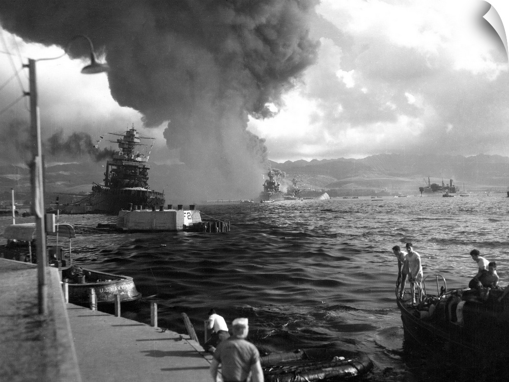The USS California (left) damaged during the Japanese attack on the U.S. naval base at Pearl Harbor, Hawaii, 7 December 19...