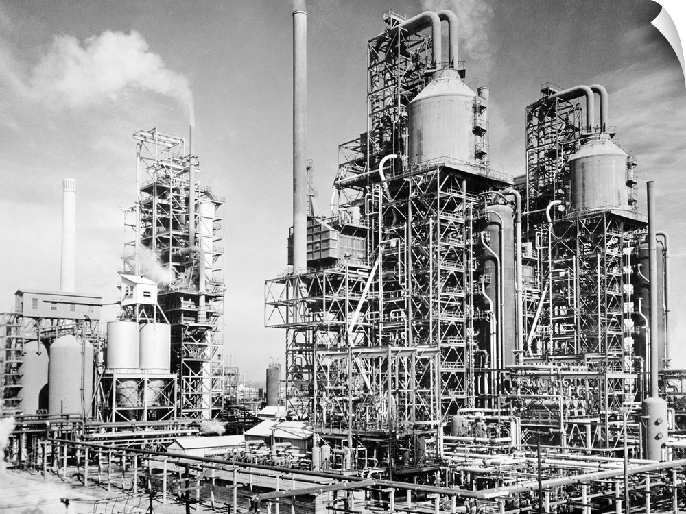 Three oil refinery units in Louisiania, which use the process of 'cracking,' set up to supply fuel for allied units fighti...