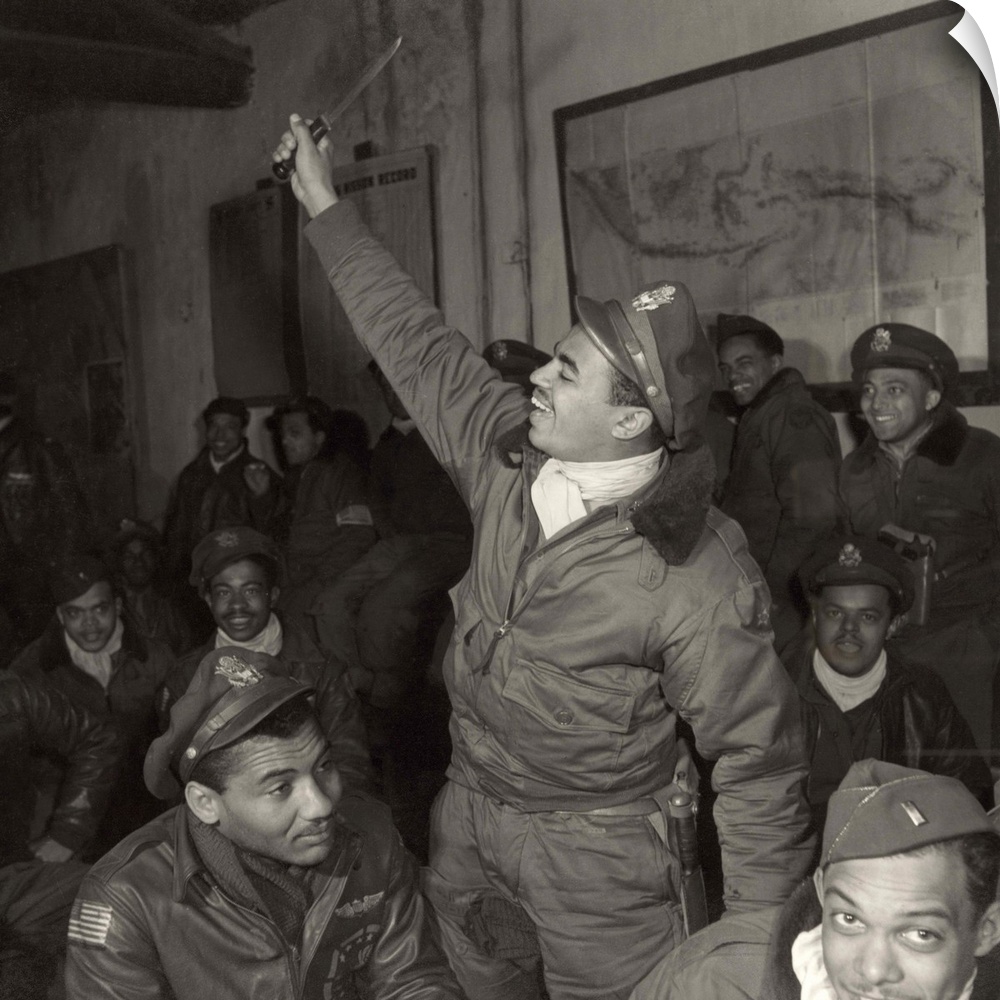 Members of the Tuskegee Airmen 332nd Fighter Group at a briefing at Ramitelli Airfield, Italy, March 1945. Photograph by T...