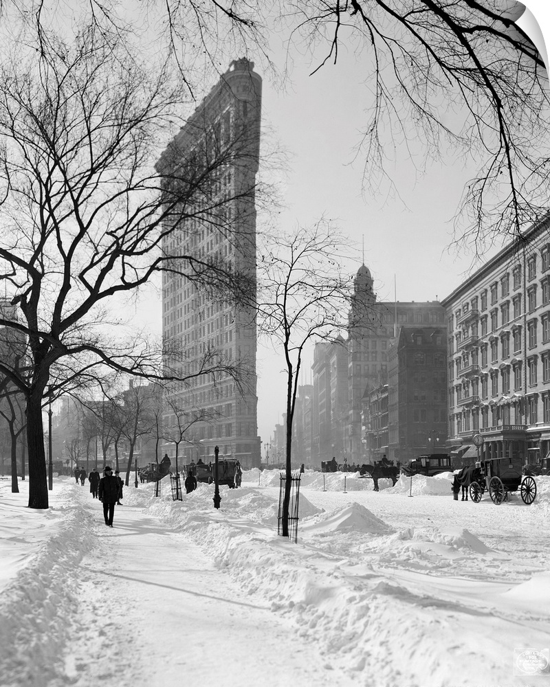 View of the Flatiron Building after a snow storm in New York City. Photograph, c1905.