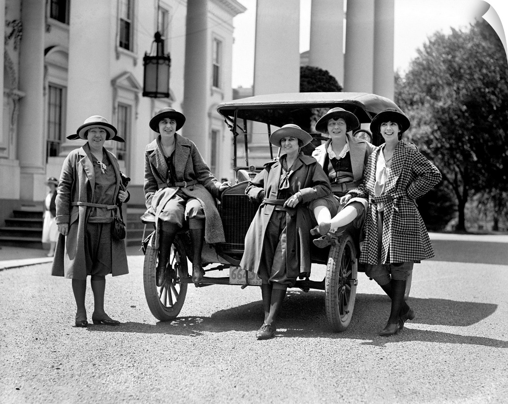 A group of women with an automobile outside the White House in Washington, D.C., 23 August 1922.