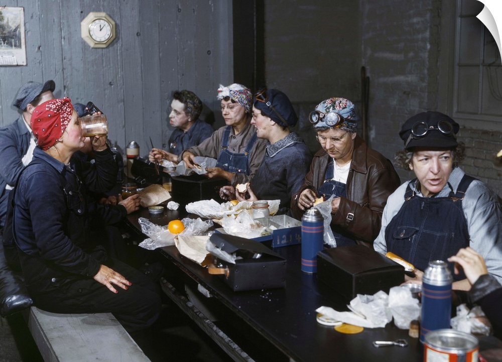 Women workers at the Chicago and North Western railroad on their lunch break in Clinton, Iowa. Photograph by Jack Delano, ...