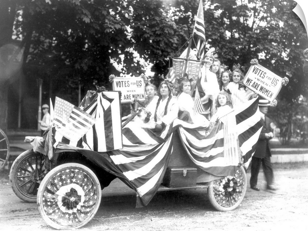 An automobile of young women and girls at a suffrage meeting, c1920.