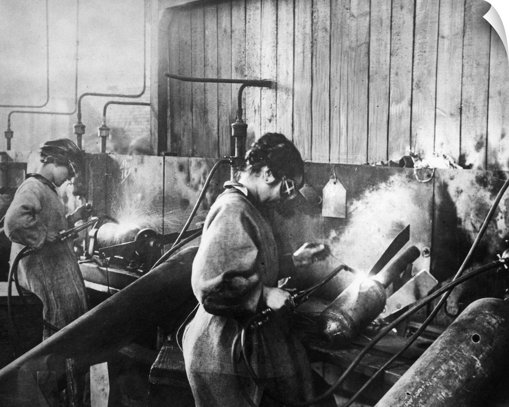 Women welding bomb casings in an American munitions factory, c1917.