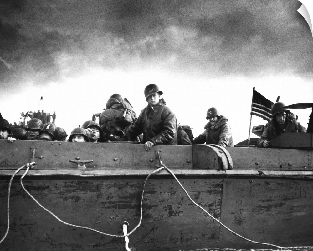 Soldiers on an American Coast Guard landing barge heading towards a Normandy beach on D-Day, 6 June 1944.