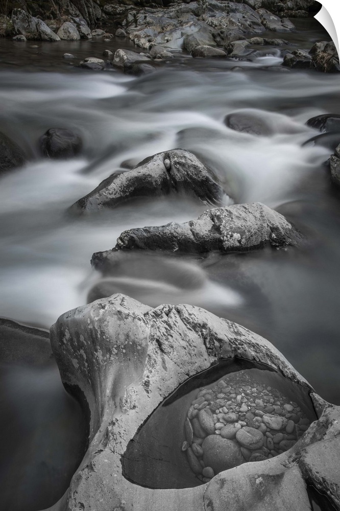 Rocky riverbed with eroded pools in a forest in the Great Smoky Mountains, Tennessee.