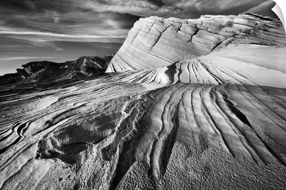 Striated rock formations in the desert near Page, Arizona, in black and white.