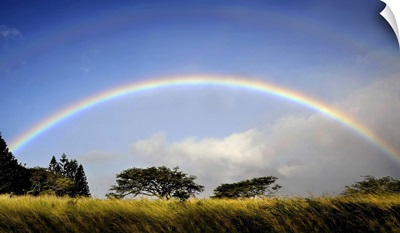 A double rainbow above countryside