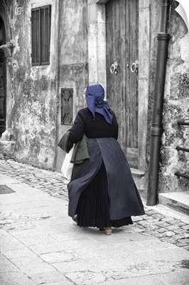 A women in traditional costume in Scanno, Italy