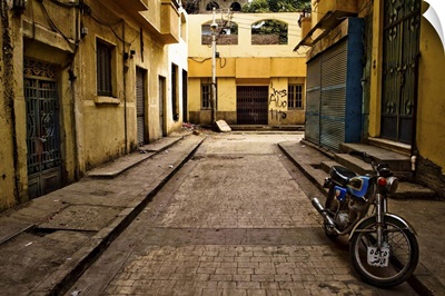 Back street of Luxor Town, Egypt with motorbike