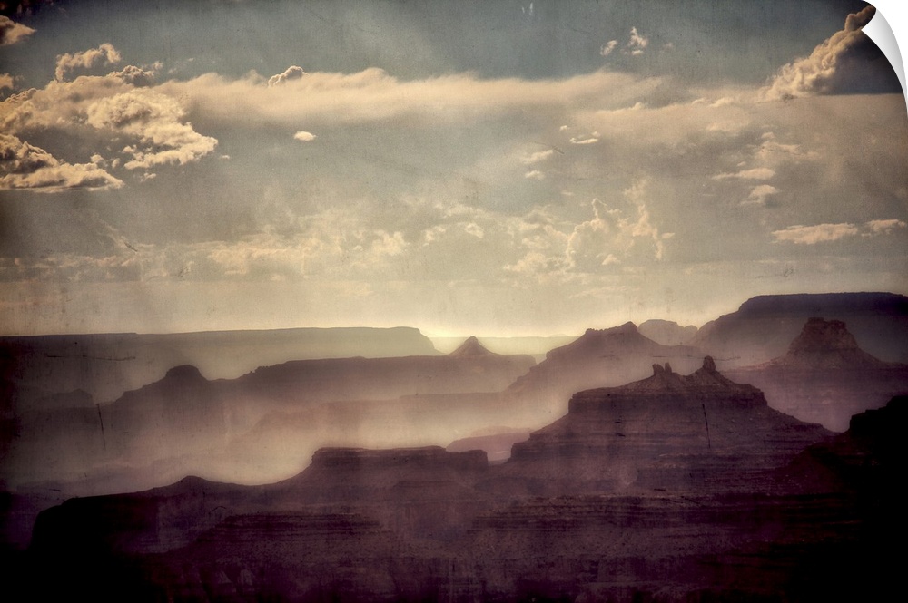 Beautiful view of the Grand Canyon  in USA with raylights in a blue summer sky with texture layer