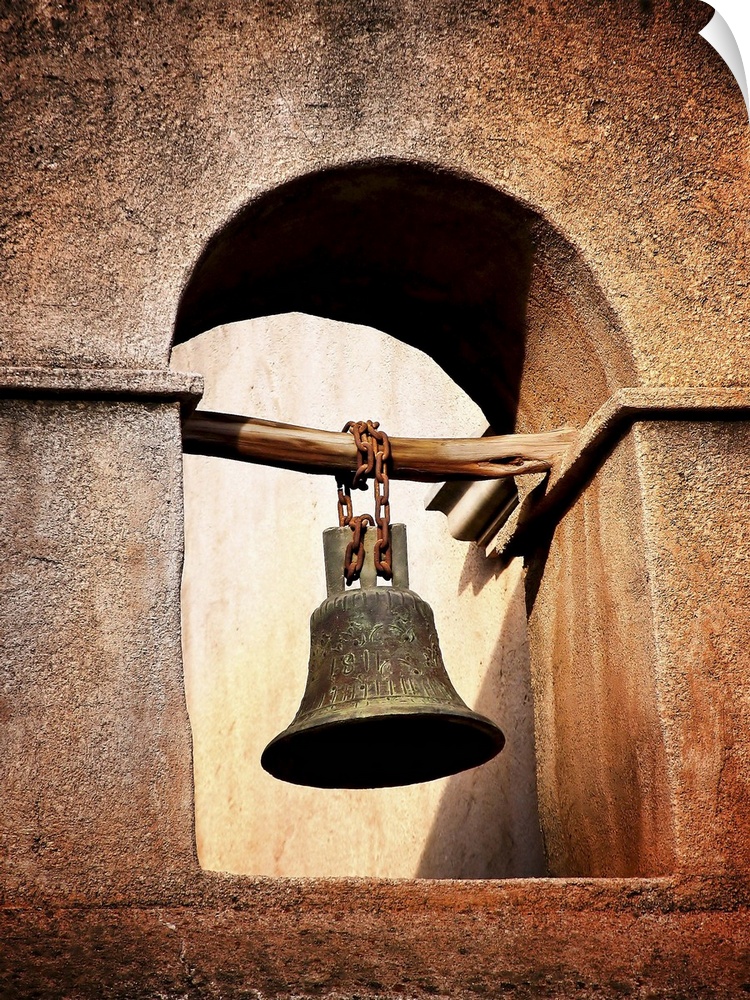 A bell hanging in a tower