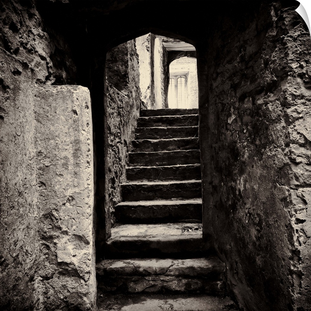 Doorway and steps in medieval castle ruins. Beupre Castle, Wales