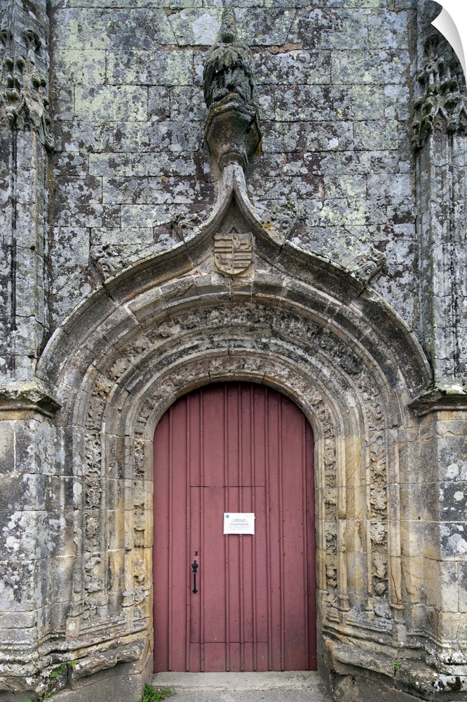 Entrance door of the Trinity chapel, town of Plumergat, France