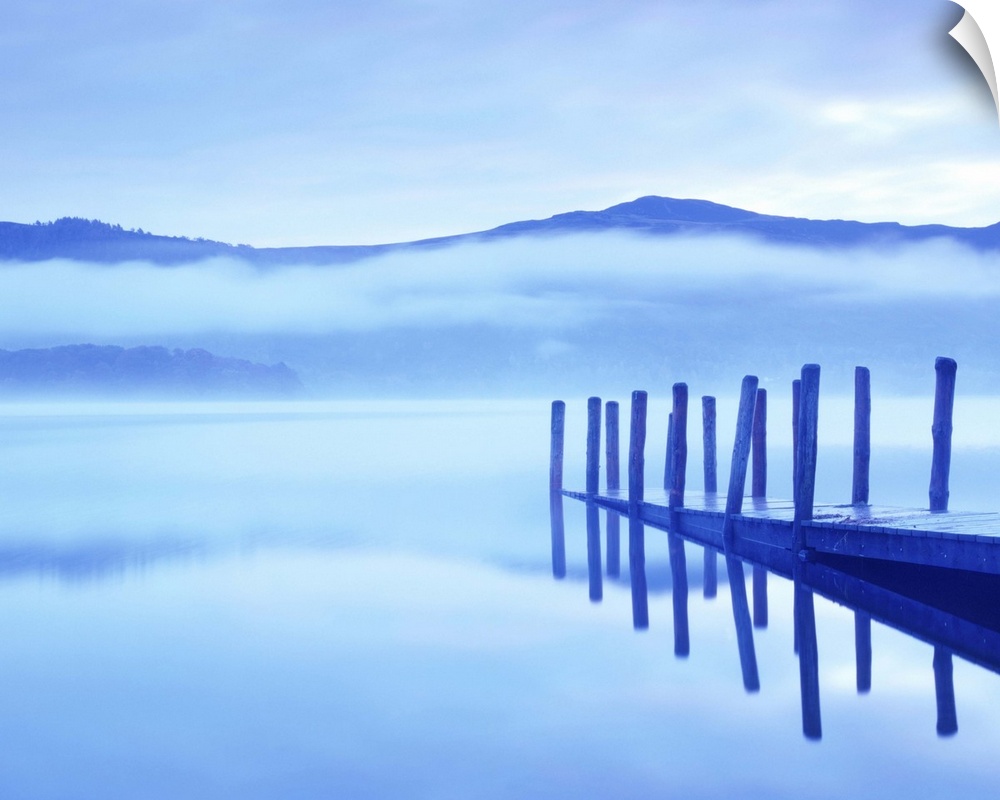 Early morning mist over Derwent Water, Lake District, Cumbria.