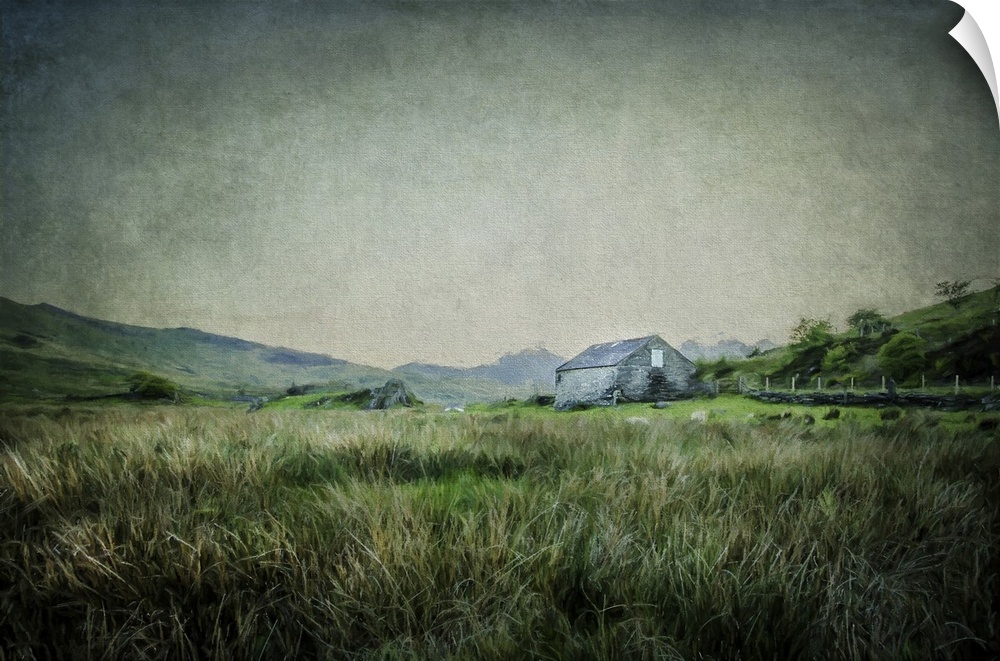 Romantic English landscape with grassland and an old stone barn. Painterly effect with texture. England.