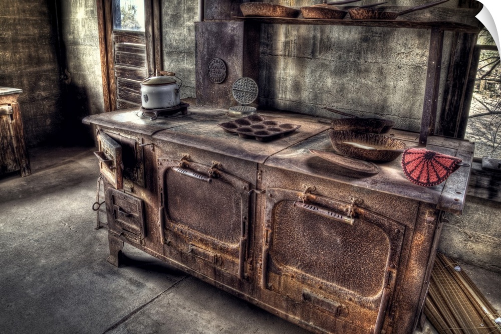 An old, rusty cook stove found in the gold mine kitchen.