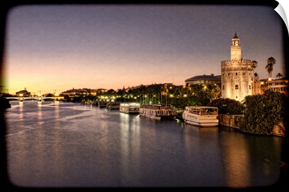 Torre del Oro (Golden Tower, 12th Century Moorish building) by the Guadalquivir river, Seville, Spain. Taken with tilted l...