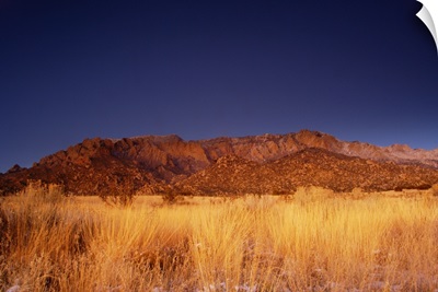 The Sandia mountains desert twilight landscape glows, New Mexico