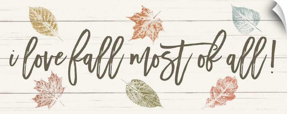 "i love fall most of all!" on a white wood plank background with fall leaves.