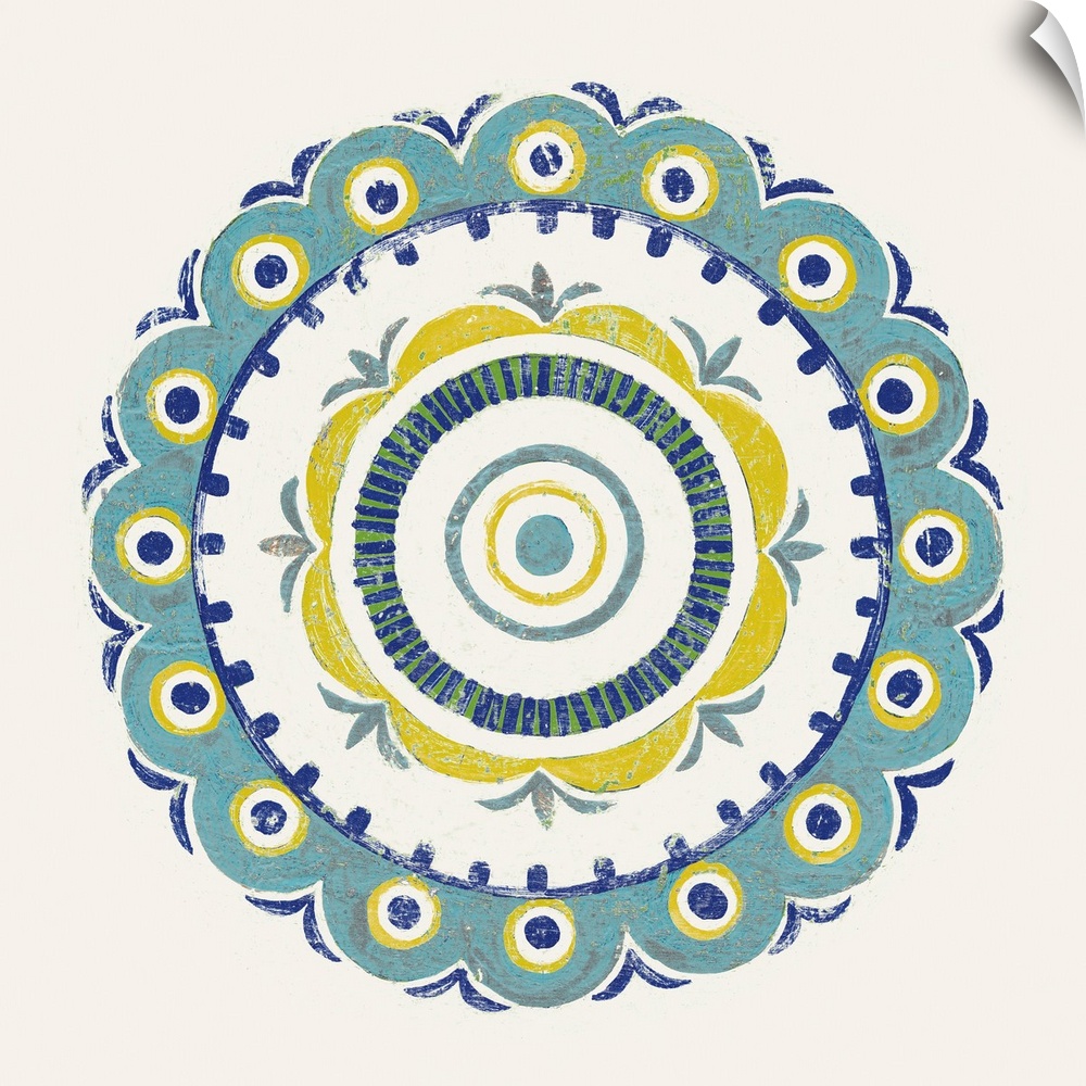 Square decor with a mandala design in the center made in shades of blue, green, and yellow on a white background.