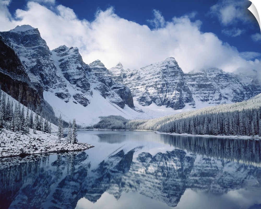 Photograph of an Autumn snowfall on Moraine Lake, Banff National Park Alberta Canada