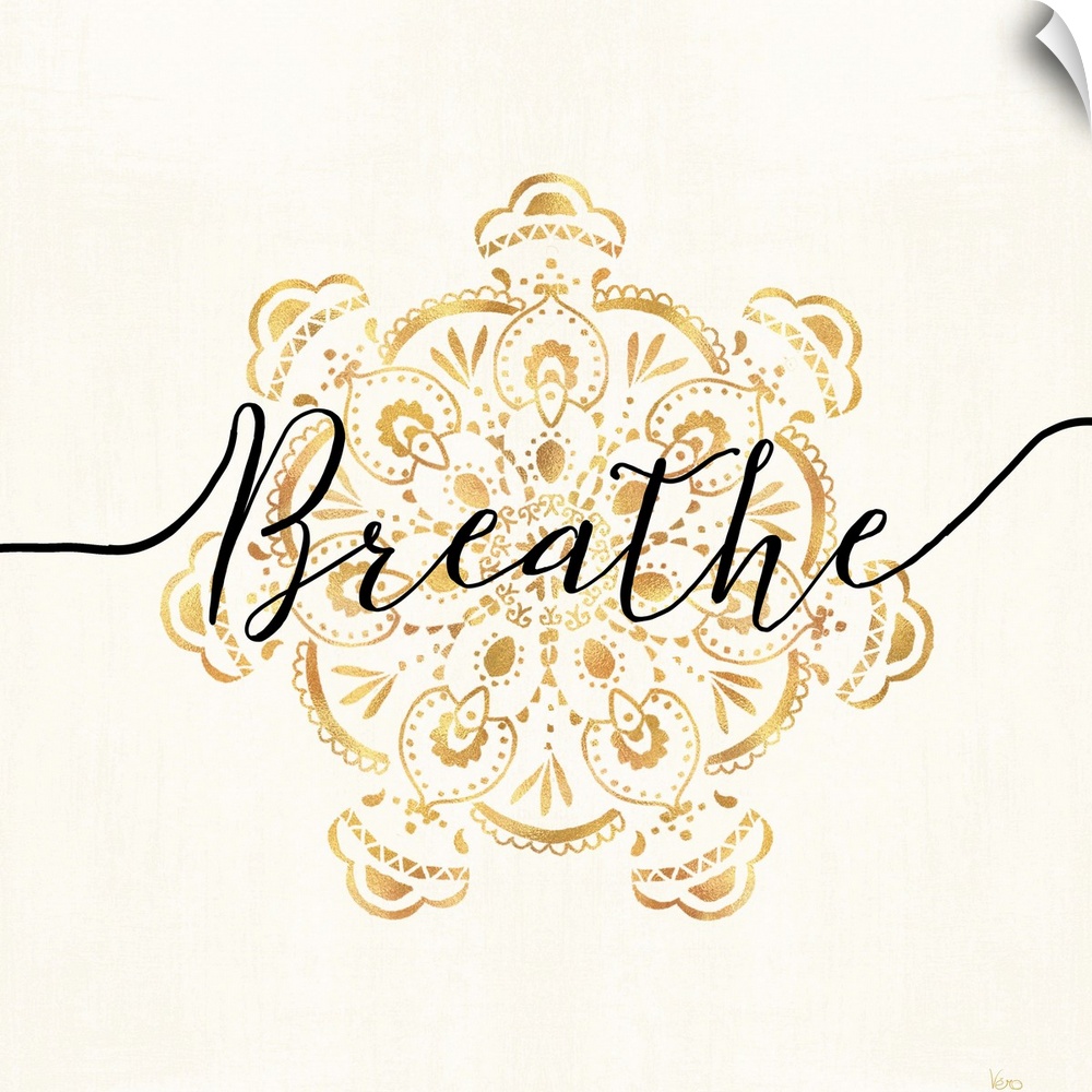 Shiny gold mandala on a neutral background with the word "Breathe" written through the center.