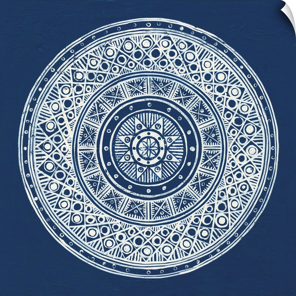 Square abstract art with a white symmetrically designed mandala on an indigo background.