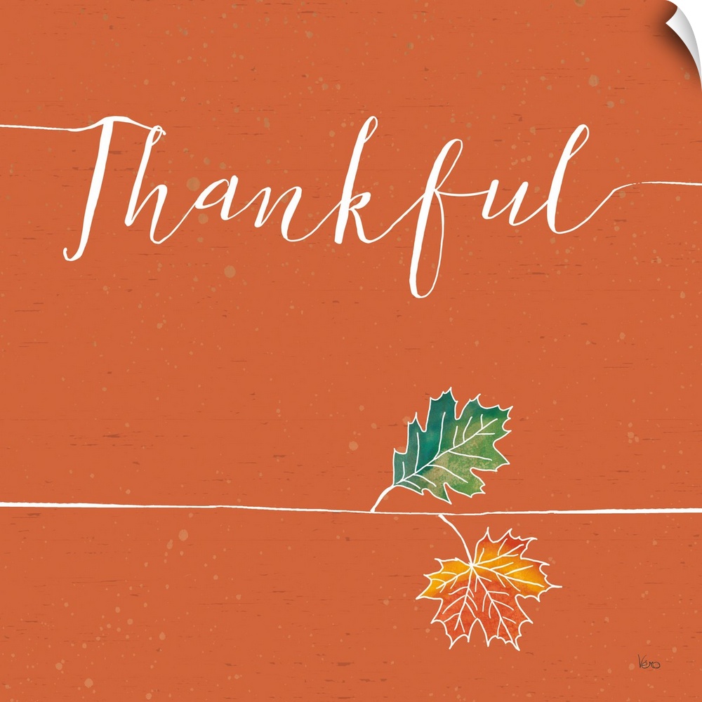 "Thankful" with a pair of fall leaves on a wood textured orange background.