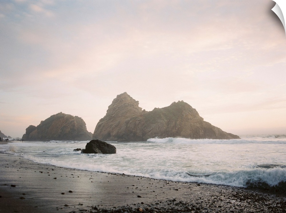 Photograph of a rocky beach at sunrise, Big Sur, California.