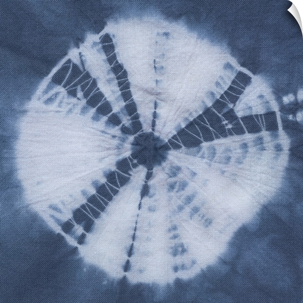 Artistic design of a large tie-dye circle in white on a blue background.